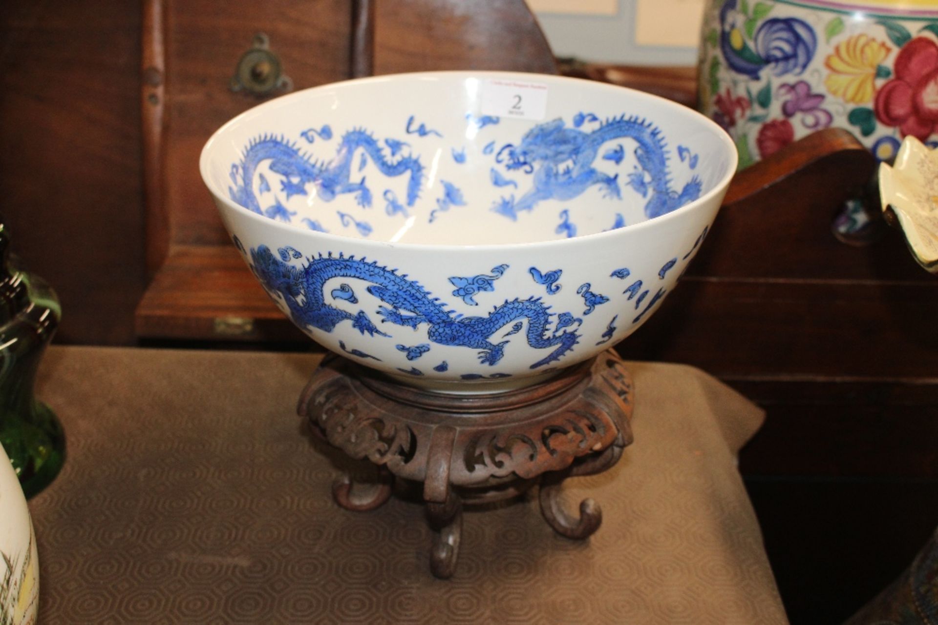 A Chinese blue and white dragon decorated bowl, ra