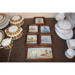 A collection of framed Delft and other tiles