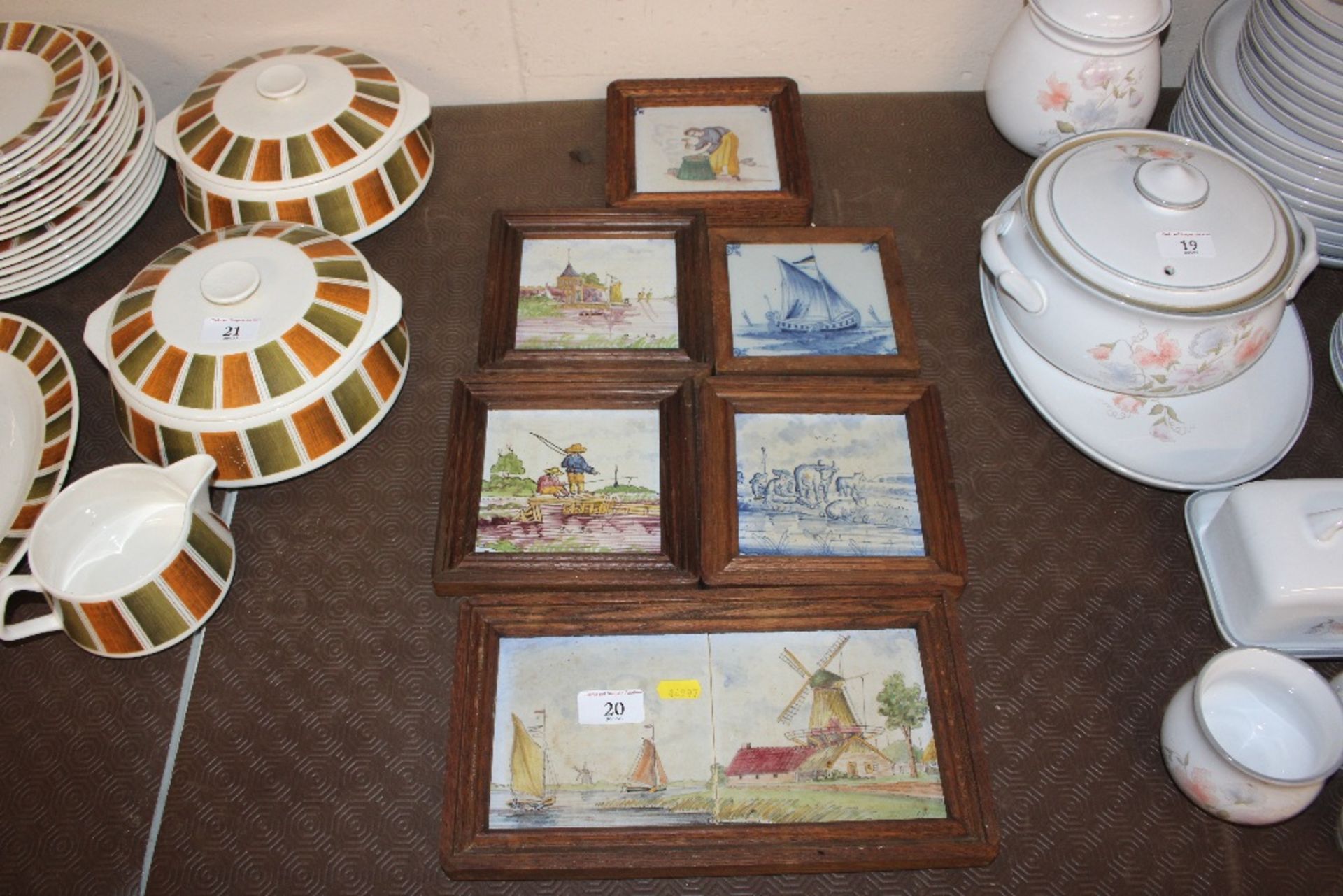 A collection of framed Delft and other tiles