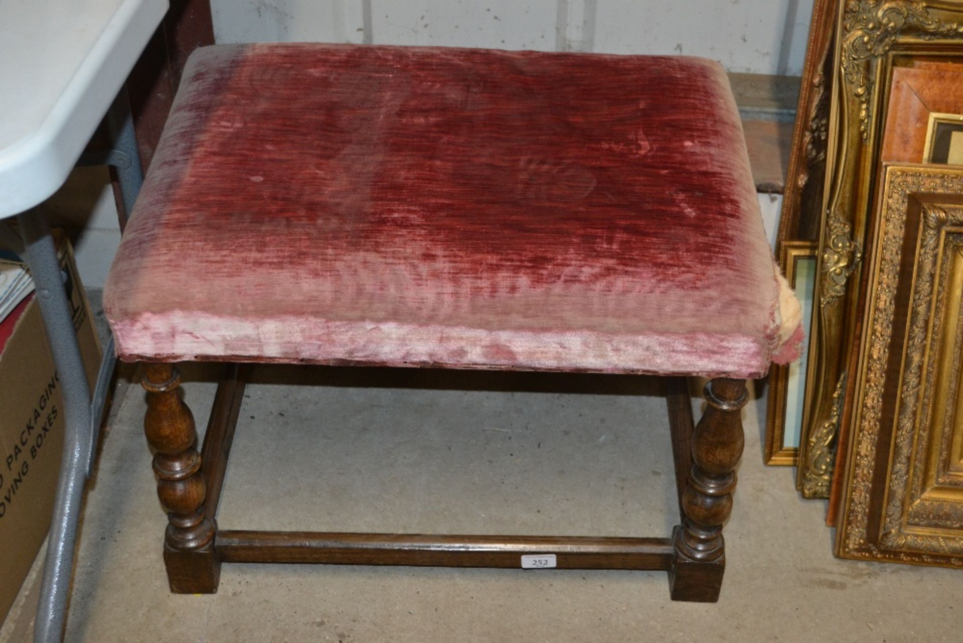 An oak upholstered stool