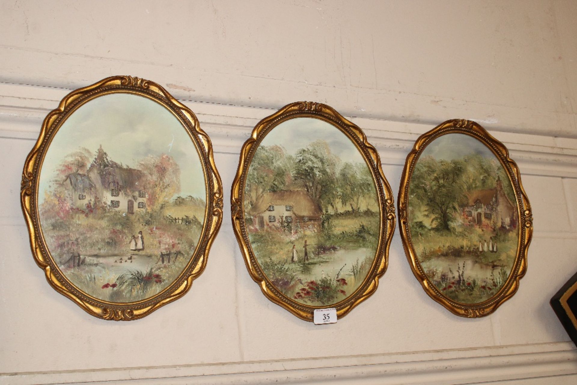 Three oval oils depicting children in rural scenes