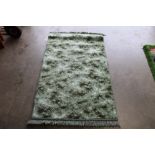 An approx. 5'3" x 3' modern wool rug