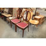 A pair of mahogany chairs with upholstered seat