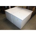 Two white painted storage boxes