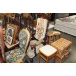 A Victorian floral upholstered elbow chair with ba