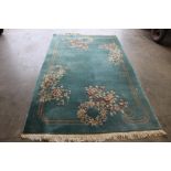 An approx. 8'4" x 4'10" Chinese style floral patte