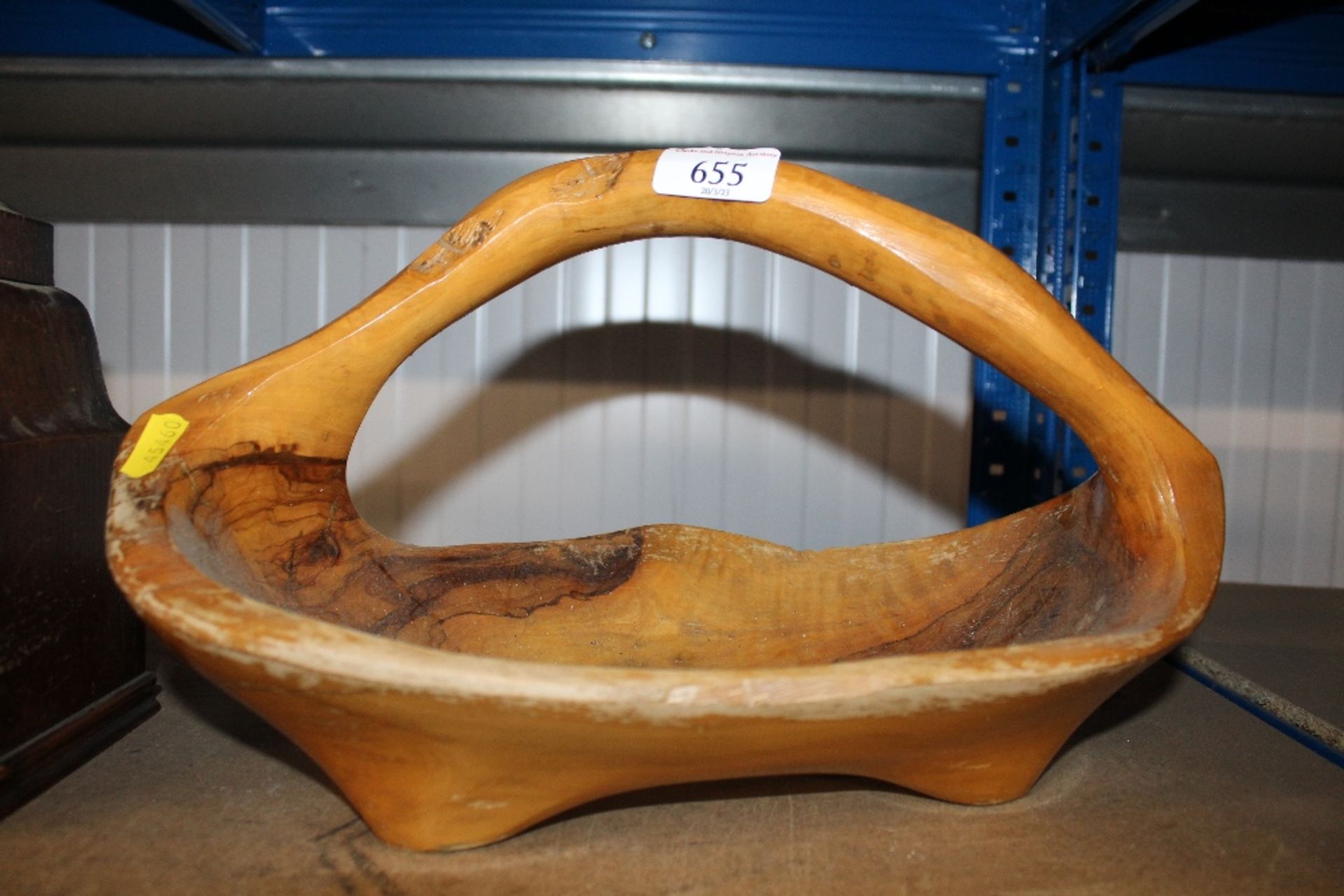 A carved wooden trug