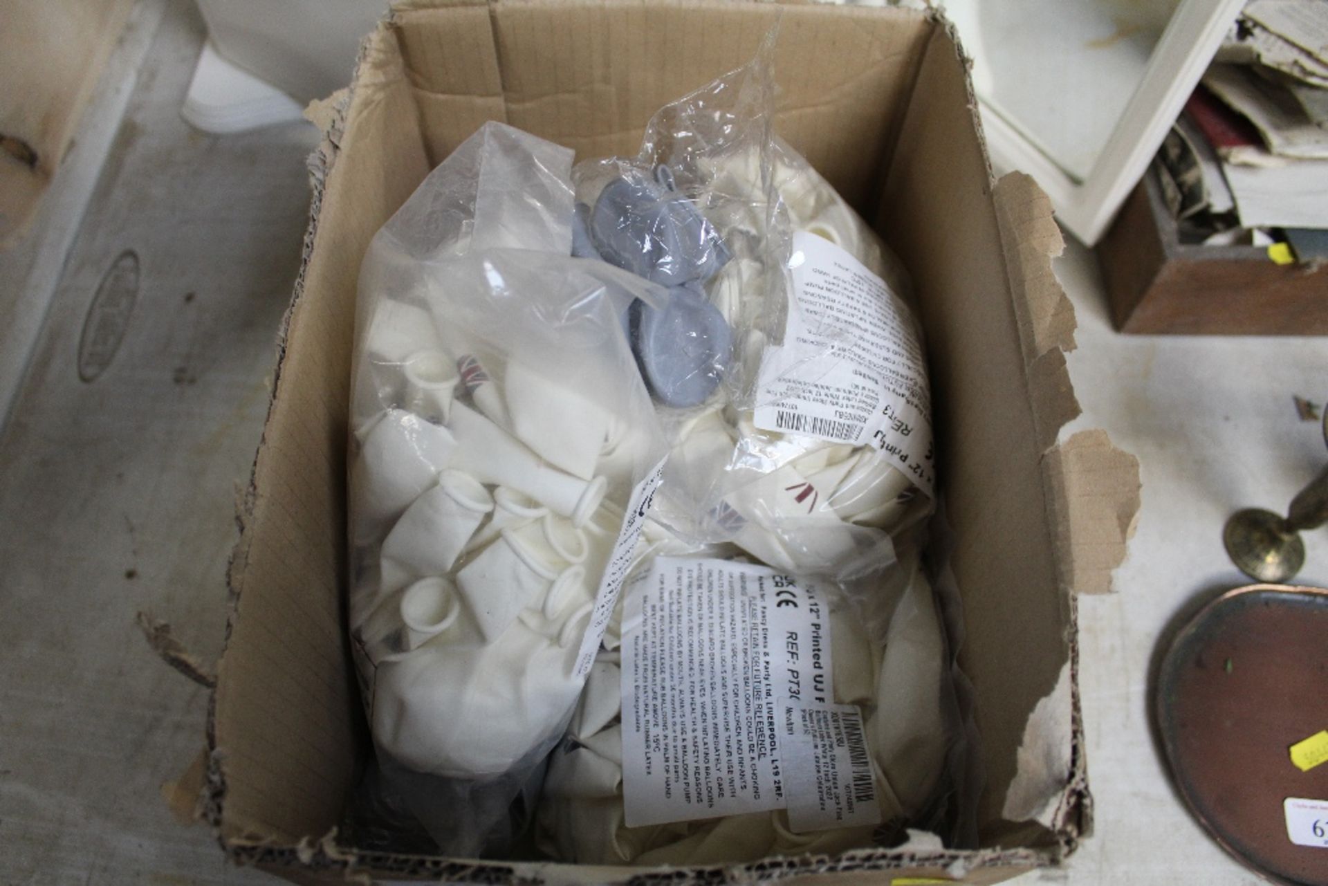 A box of Union Jack decorated balloons