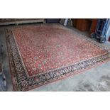 An approx. 13'5" x 10'5" floral patterned carpet A