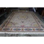 An approx. 14'2" x 9'10" floral patterned carpet