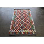 An approx. 5'3" x 3'2" Chobi Kelim rug