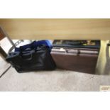 Two brief cases and a small quantity of satchels /