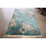 An approx. 8'6" x 4'10" Chinese style floral patte