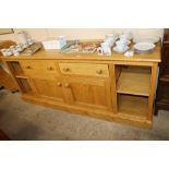 A large light oak sideboard