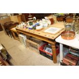 A pine and metal mounted kitchen table