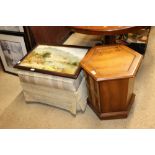 An octagonal CD cabinet and an upholstered stool