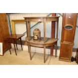 A pair of 19th Century mahogany D end tables