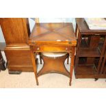 A mahogany and leather mounted envelope card table