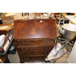 A reproduction mahogany bureau AF