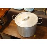 A vintage two handled aluminium cooking pot