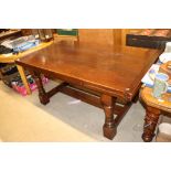 A large oak draw leaf refectory type dining table