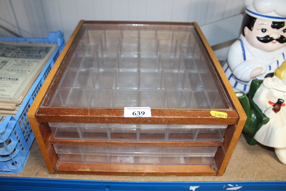 A glass two drawer specimens chest