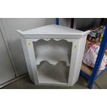 A white painted corner unit