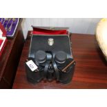 A pair of Prince 10 x 50 binoculars with carry cas