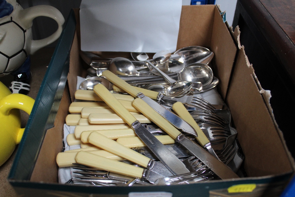 A box of various silver plated and other cutlery