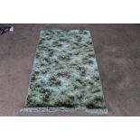 An approx. 5'3" x 3' modern wool rug