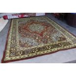 An approx. 11'11" x 9'1" floral patterned carpet