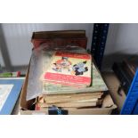 A box containing various vintage Rupert annuals; B