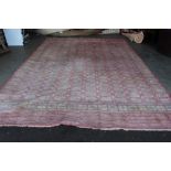 An approx. 14' x 9'11" Eastern patterned carpet