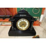 A slate two hole mantel clock