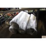 Four rolls of floor underlay