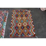 An approx. 4'1" x 2'7" Chobi Kelim rug