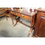 A mahogany sofa table fitted two drawers together