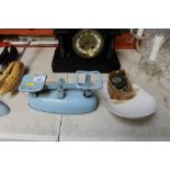 An enamelled kitchen scale and weights