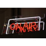 A neon "On Air" wall light