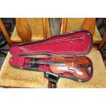 A violin and bow in fitted case