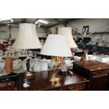 Two figural decorated table lamps and one other