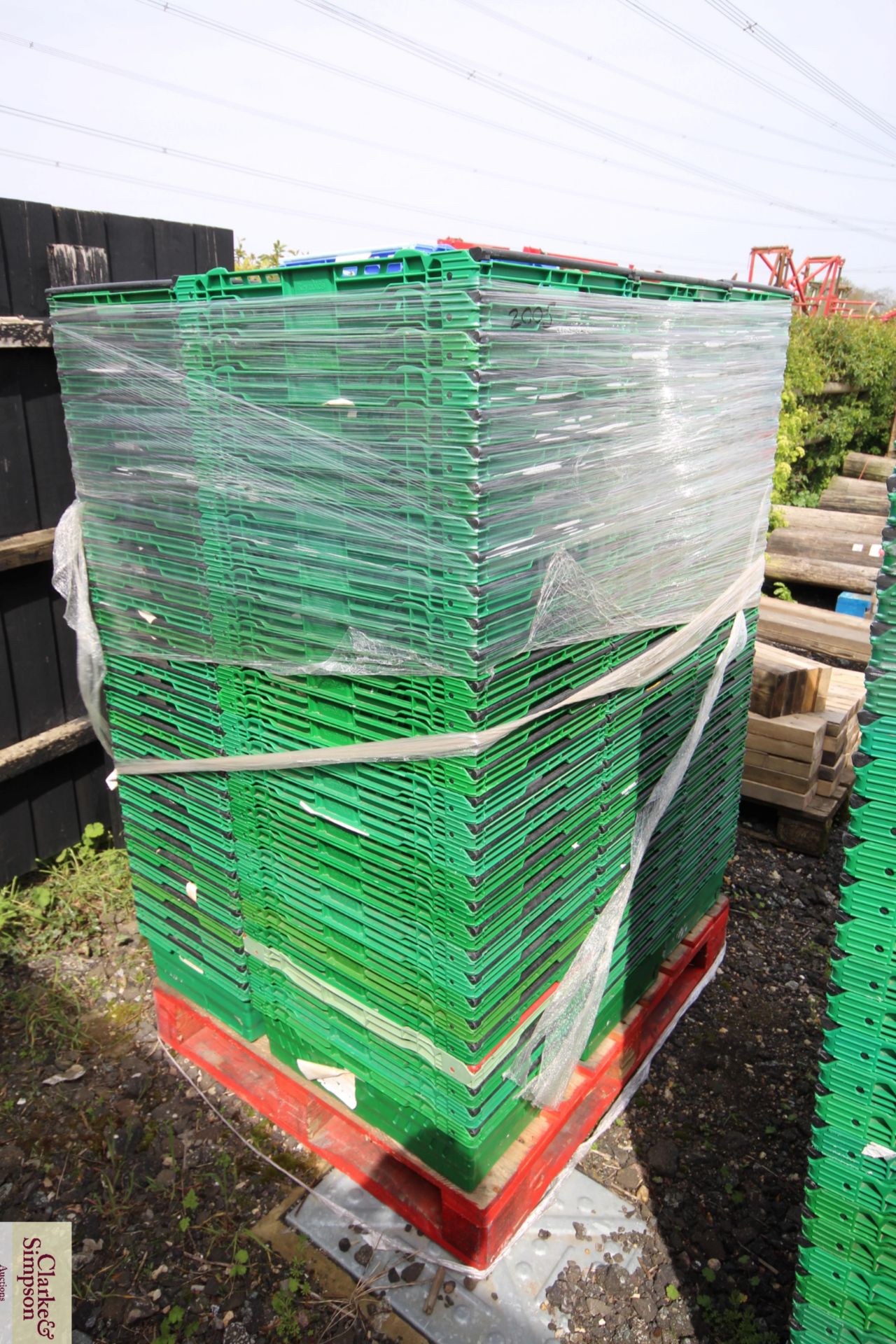 Pallet of stacking vegetable crates.