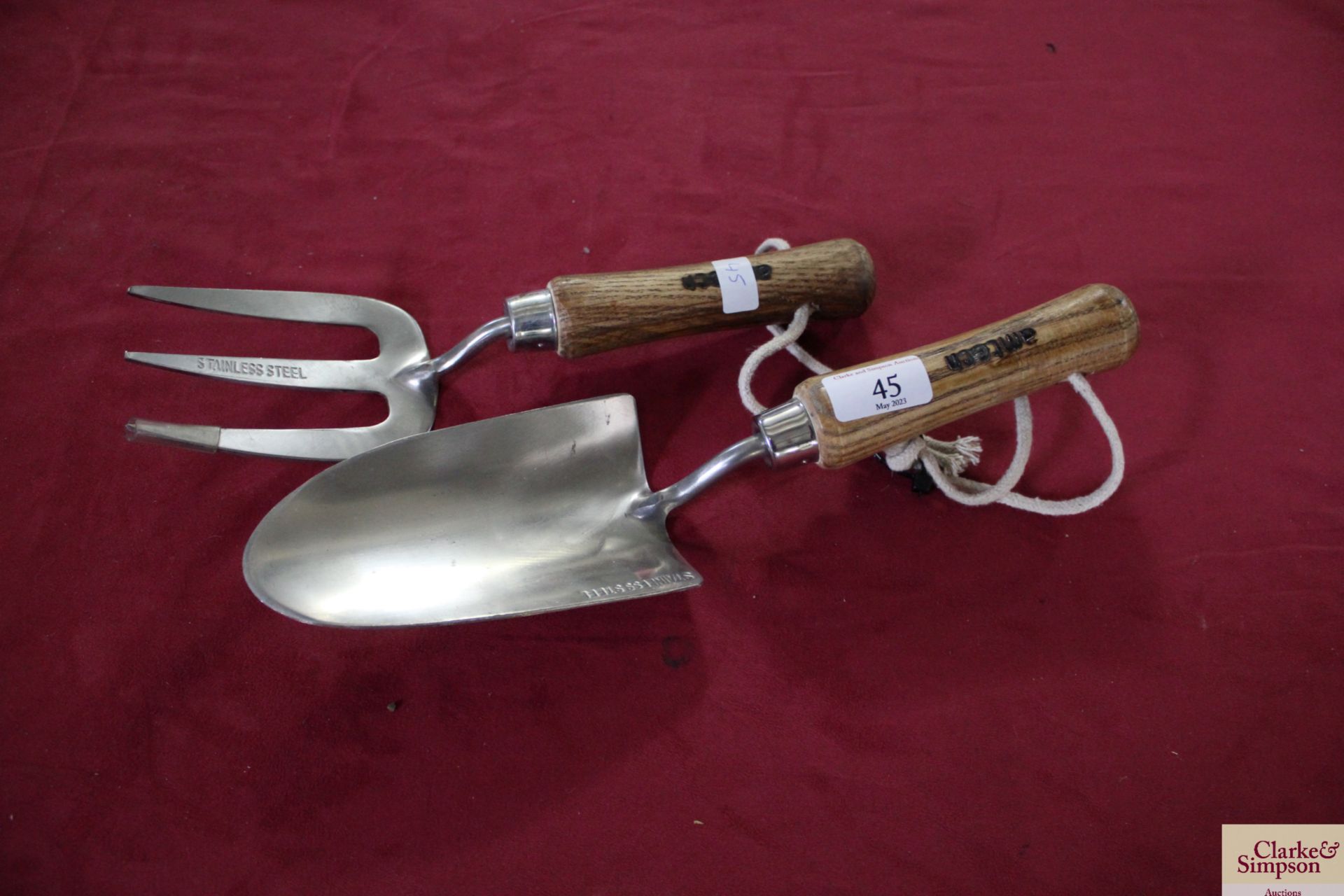 Stainless steel hand trowel and fork. V
