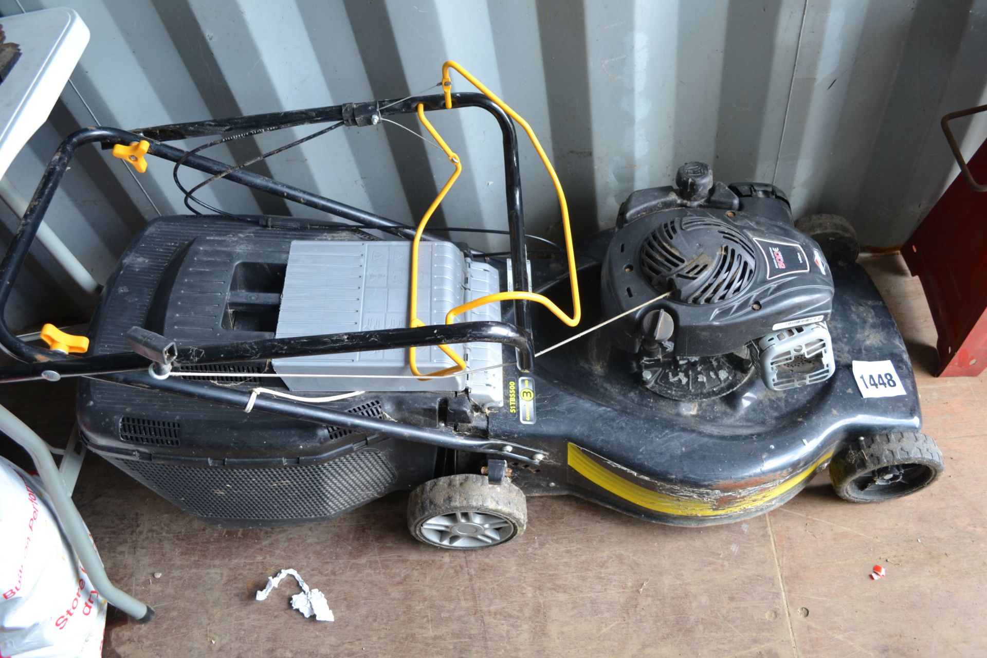 Lawnmower with Briggs & Stratton engine.