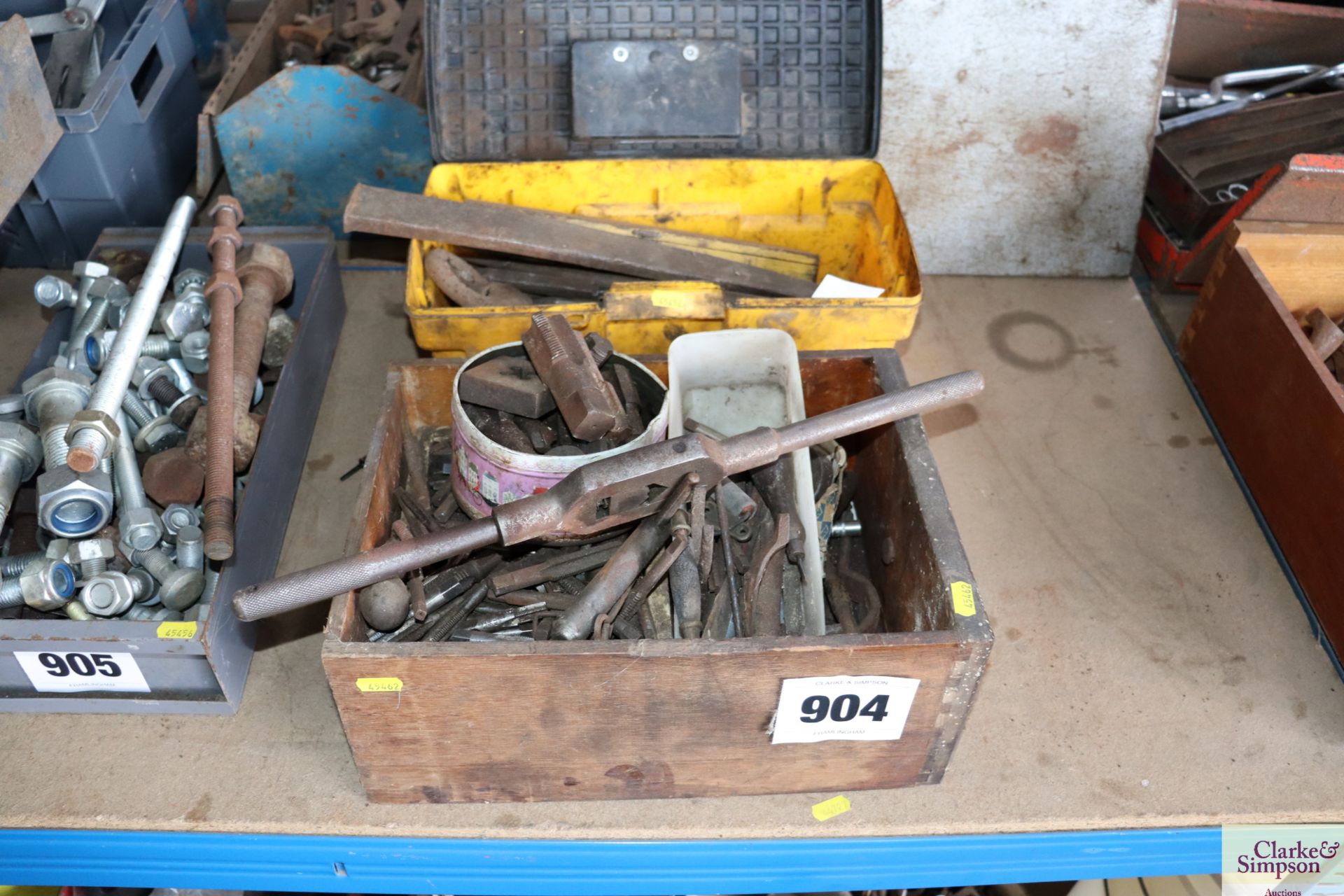 Box of various large taps and dies and a box of wedges.