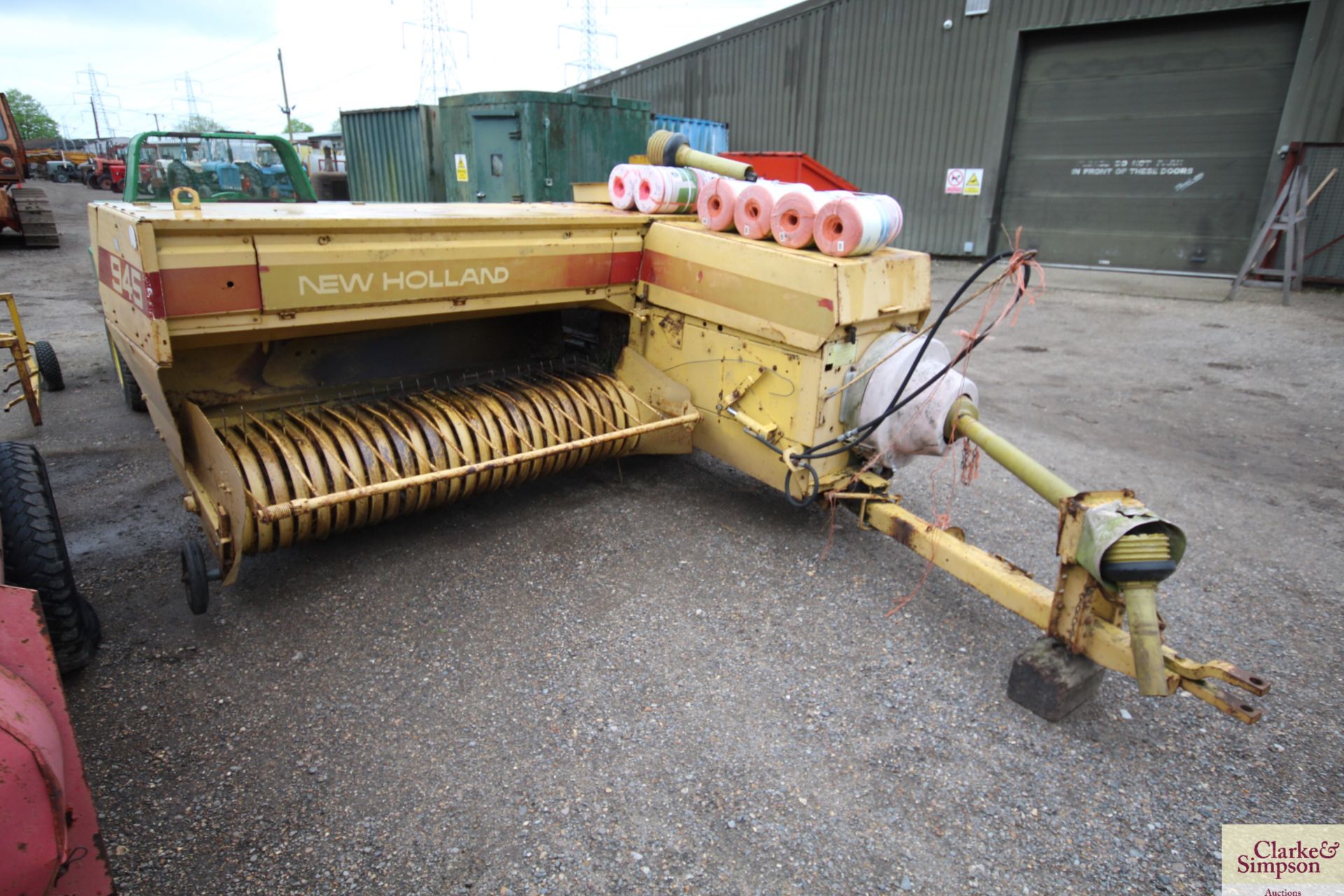 New Holland 945 conventional baler. Serial number 145. With a large quantity of twine. From a