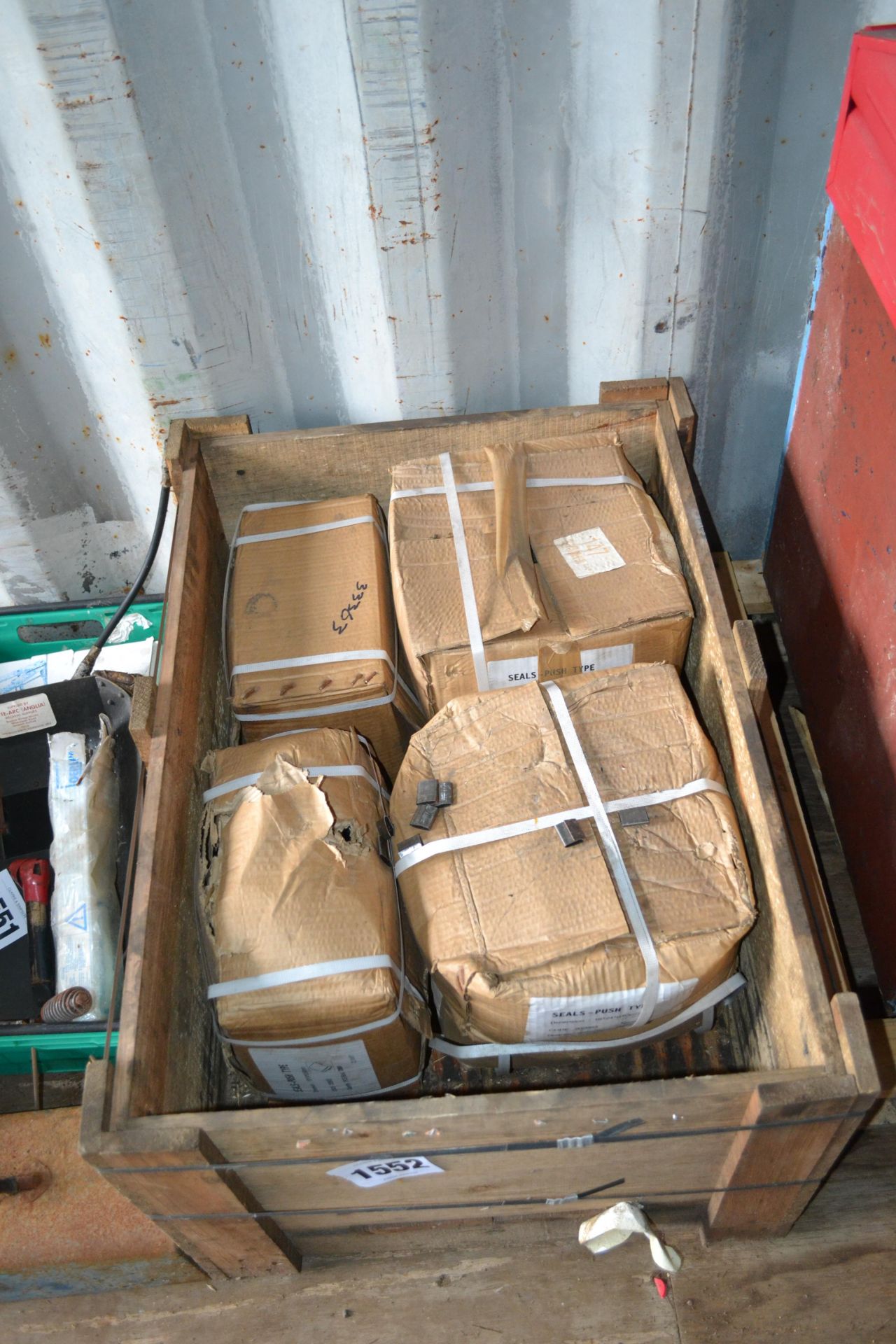 Crate containing large quantity of banding seals.