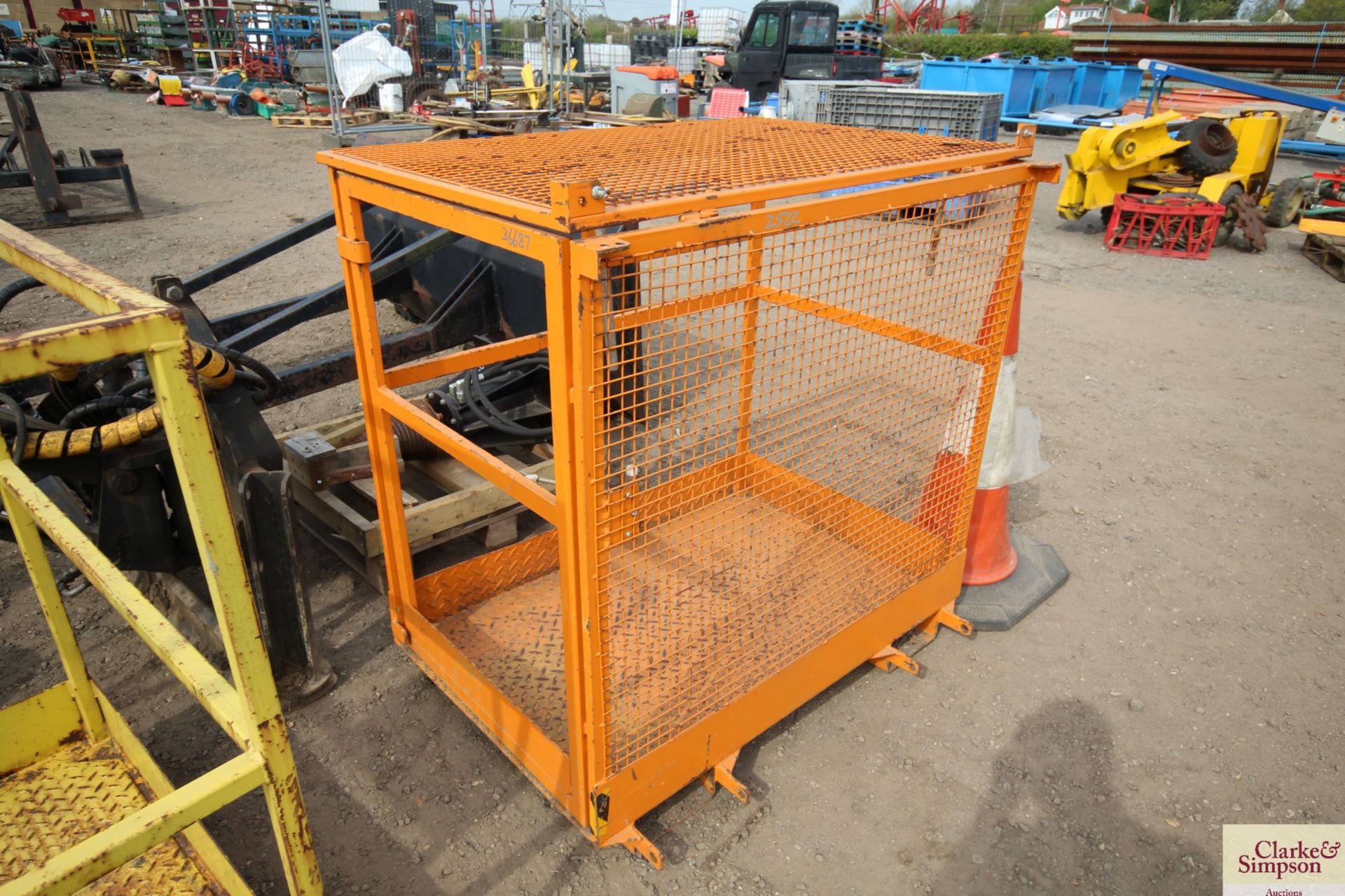 Man cage to fit pallet tines.