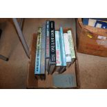 A box containing mostly Aviation books