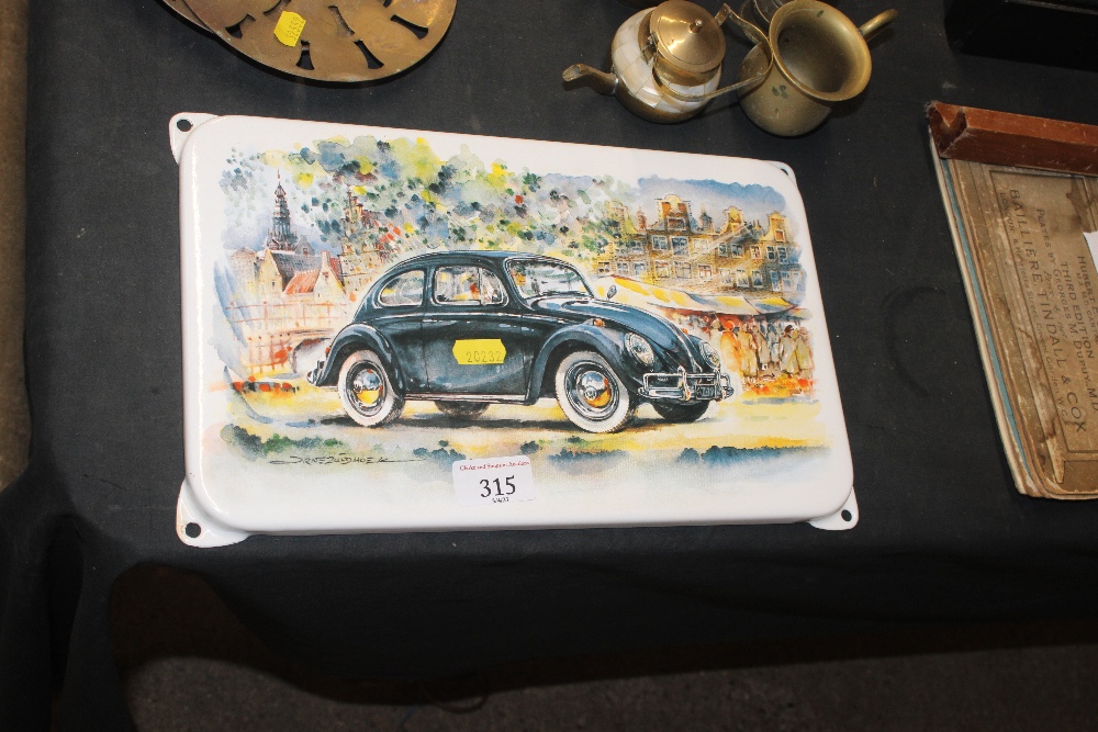 An enamel plaque depicting a VW Beetle